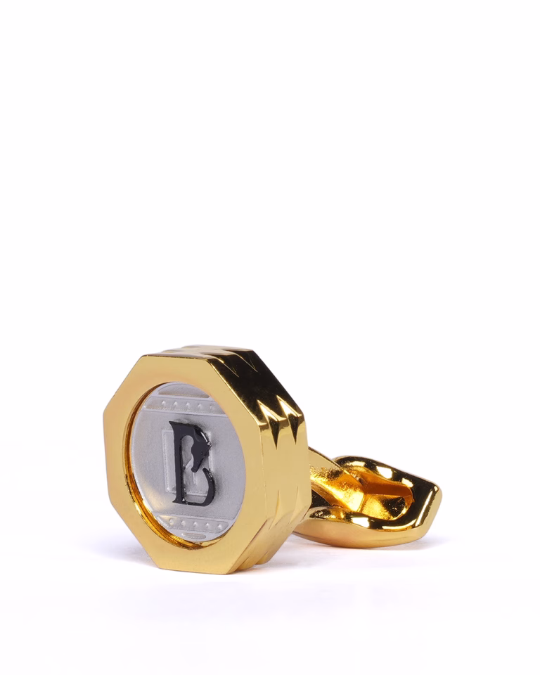 دکمه سرآستین طلایی طرح لوگو